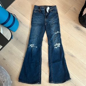 american eagle high rise stretch flare jeans. completely new
